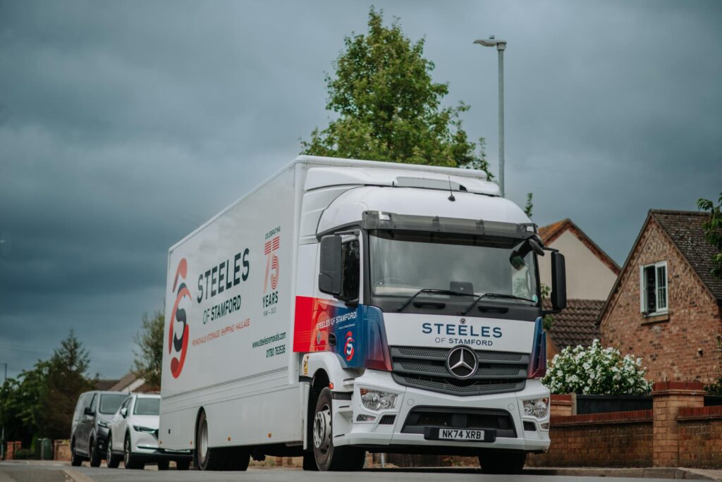 Steeles of Stamford removals lorry parked up on a residential street